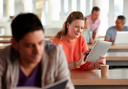 People working in an breakout office.  People working in an breakout office.